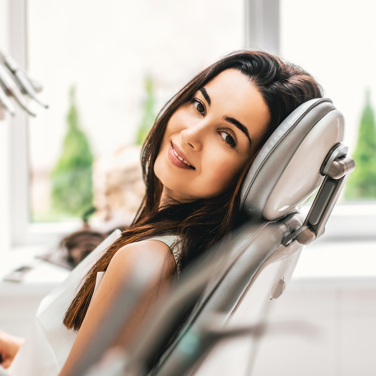 Happy patient in the dental chair